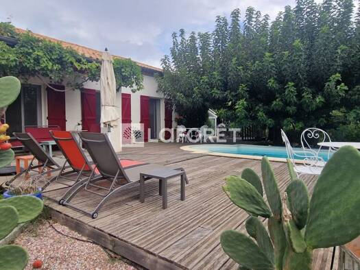 Maison de plain-pied à vendre 499 000 € 4 pièces 2 chambres 131 m² 975 m² de terrain Centre Ville Juvignac 34990