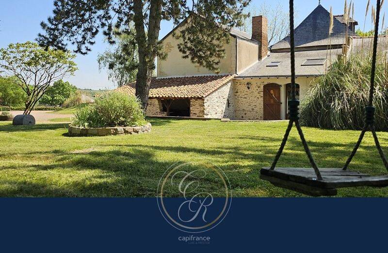 Maison 16 pièces 409 m² · à Bellevigne-en-Layon · 409 m² · 599 000 €