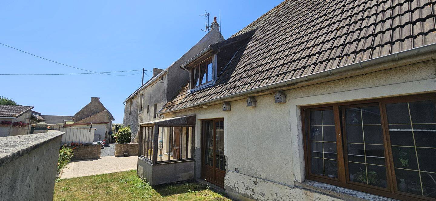 Maison 9 pièces 213 m² · à Cricqueville-en-Bessin · 213 m² · 260 000 €