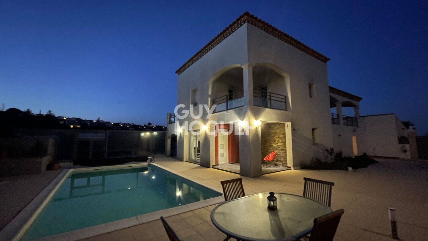 Maison 8 pièces 163 m² · à Juvignac · 163 m² · 628 000 €