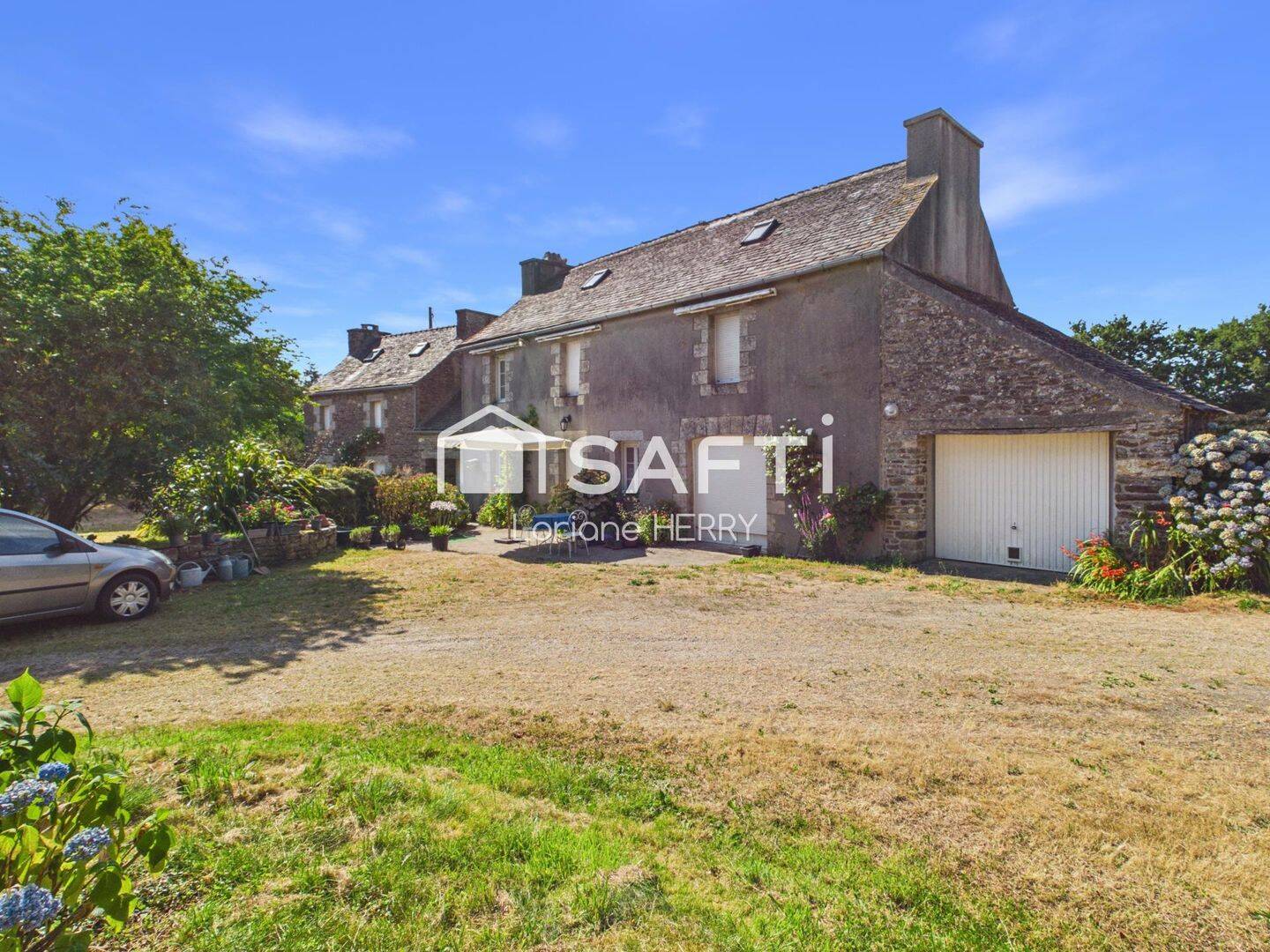 Maison 7 pièces 205 m² · à Guimiliau · 205 m² · 291 000 €