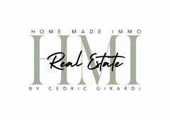 H.M.I REAL ESTATE logo